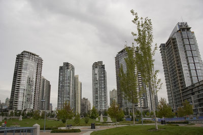 Low angle view of skyscrapers against sky