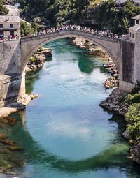 Arch bridge over river