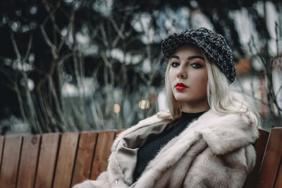 Portrait of woman wearing cap