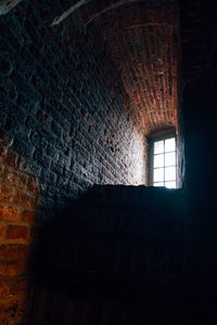 Low angle view of window in old building