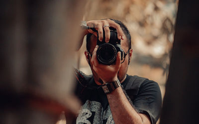 Portrait of man photographing