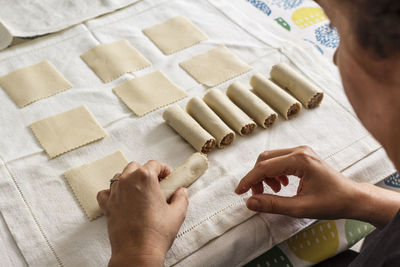 High angle view of people preparing food