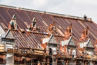 Low angle view of construction site against sky