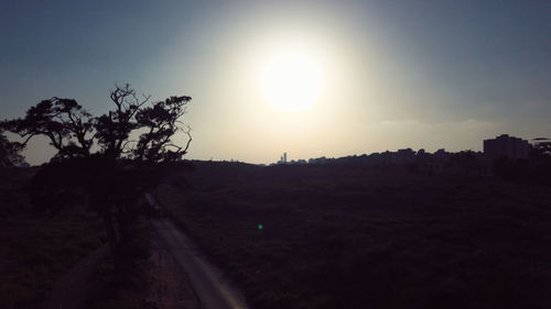 Scenic view of silhouette landscape against sky during sunset