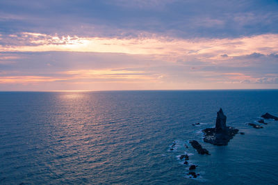 Scenic view of sea against romantic sky