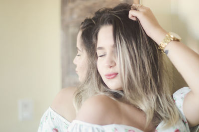 Portrait of beautiful woman at home