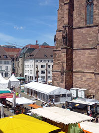 Buildings in city against sky