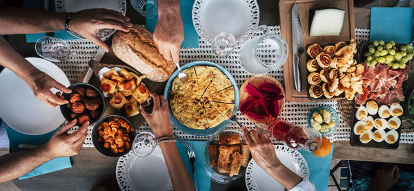 Directly above shot of people having meal on table