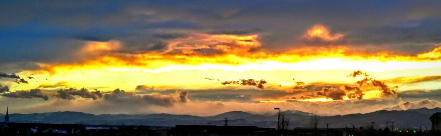 Scenic view of mountains at sunset