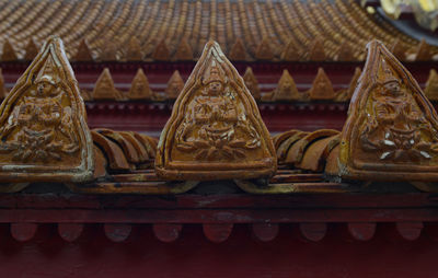 Carving of sculpture on temple roof