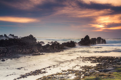 Scenic view of sea against sky during sunset