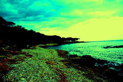 Scenic view of sea at sunset