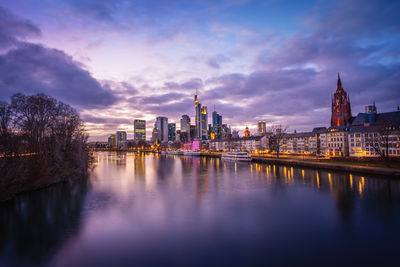 Illuminated buildings in water