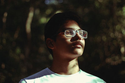 Close-up of young man wearing eyeglasses