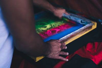 High angle view of hands