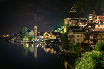 Illuminated buildings in town at night