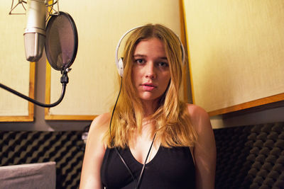 Young woman at a recording studio