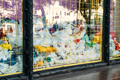 Many plastic bags street installation 