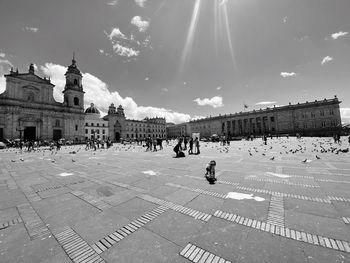 People crossing street in city