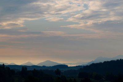 Scenic view of mountains against sky during sunset