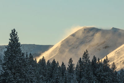 Scenic view of mountains against sky during winter