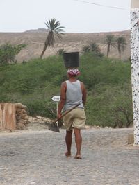 Full length rear view of man in park