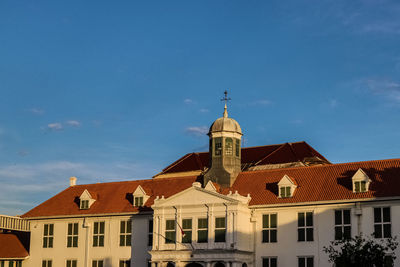 Buildings against blue sky