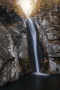 View of waterfall in forest