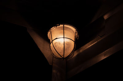 Low angle view of illuminated light bulb