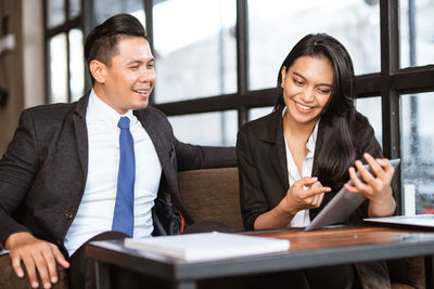 Business colleagues working at office