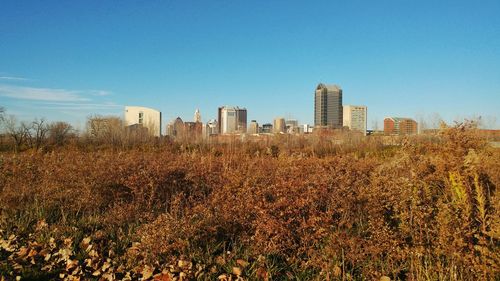 View of cityscape against clear sky