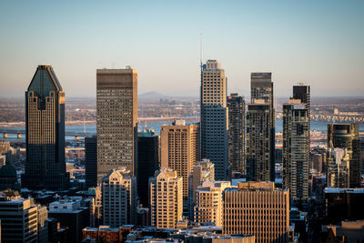 Modern buildings in city against sky