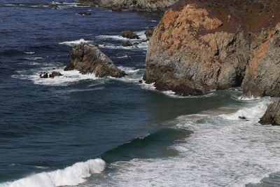 View of rocks in sea
