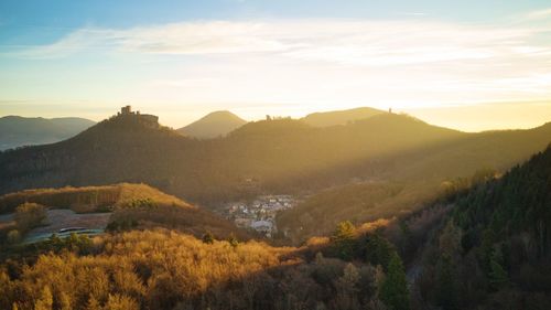 Scenic view of mountains against sky during sunset