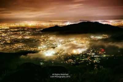 Illuminated cityscape at night