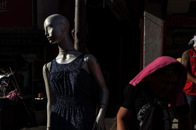 Full length of woman standing in store