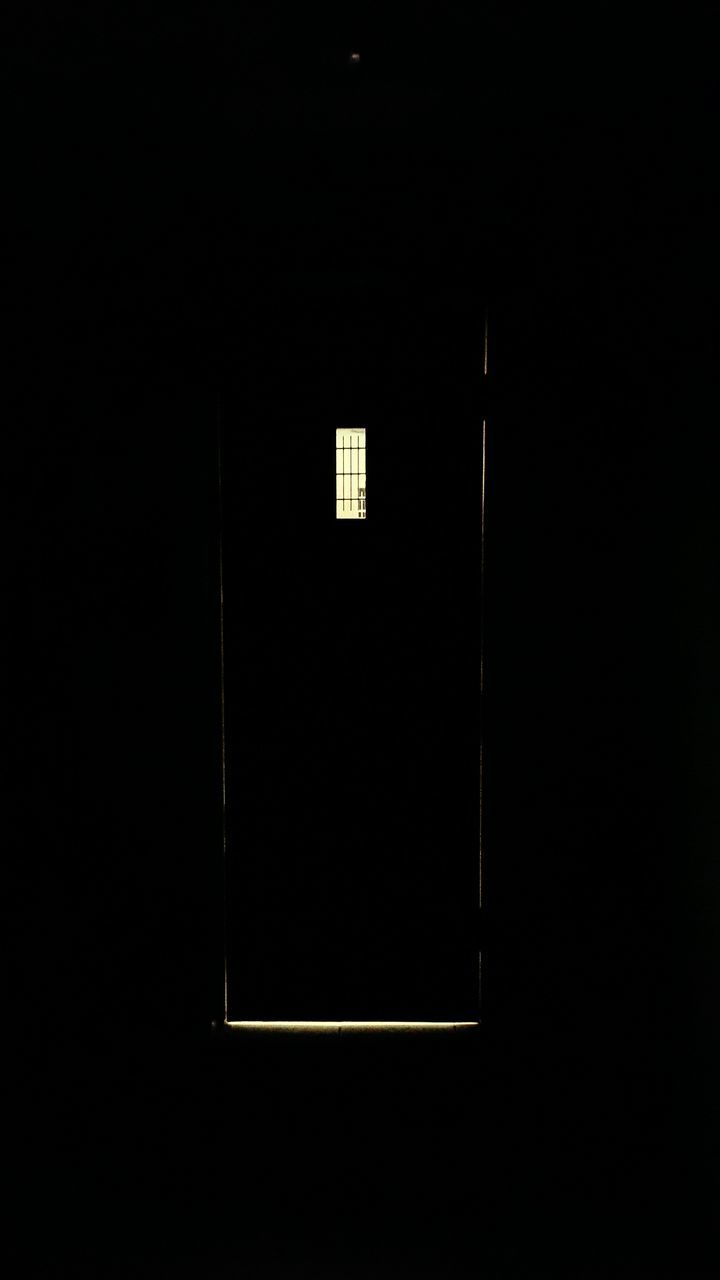 architecture, built structure, dark, indoors, copy space, window, wall - building feature, door, house, darkroom, night, wall, closed, no people, illuminated, building exterior, shadow, building, entrance, darkness