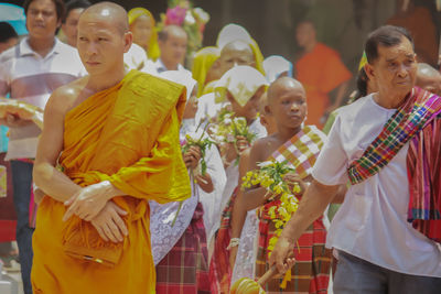 Rear view of people in traditional clothing