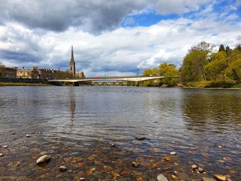 View of river against cloudy sky