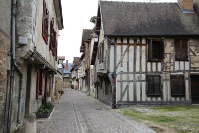 Cobbled street with old houses