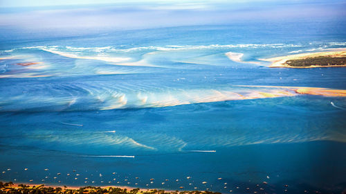 Aerial view of sea against sky