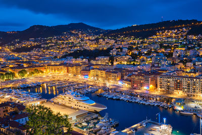 View of old port of nice with yachts, france in the evening