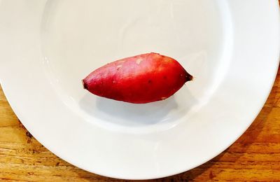 Close-up of strawberry in plate on table