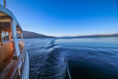 Scenic view of sea against clear blue sky