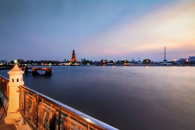 Scenic view of chao phraya river against sky during sunset