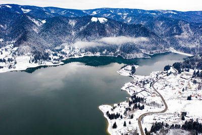 High angle view of snowcapped mountains against sky