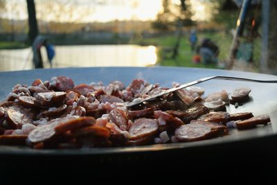 Close-up of meat on barbecue grill