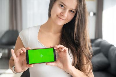 Young woman using digital tablet