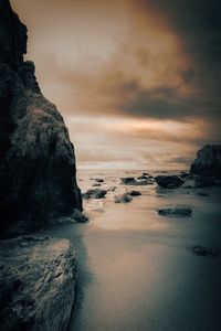 Scenic view of sea against sky during sunset