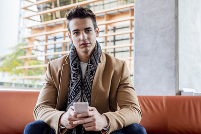 Young man using mobile phone